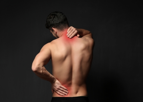 man suffering from spinal stenosis